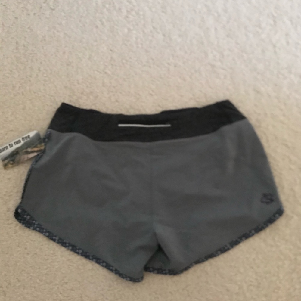 Run in Rabbit Women Hopper Shorts, size medium. Grey heather w/ flowers on trim - Picture 2 of 3
